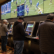 Editorial illustration of casino game technology showcased at G2E 2026 in Las Vegas